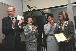 Nami graciously accepts her award