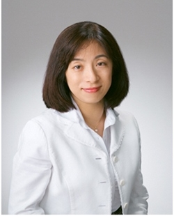 定塚由美子内閣審議官写真